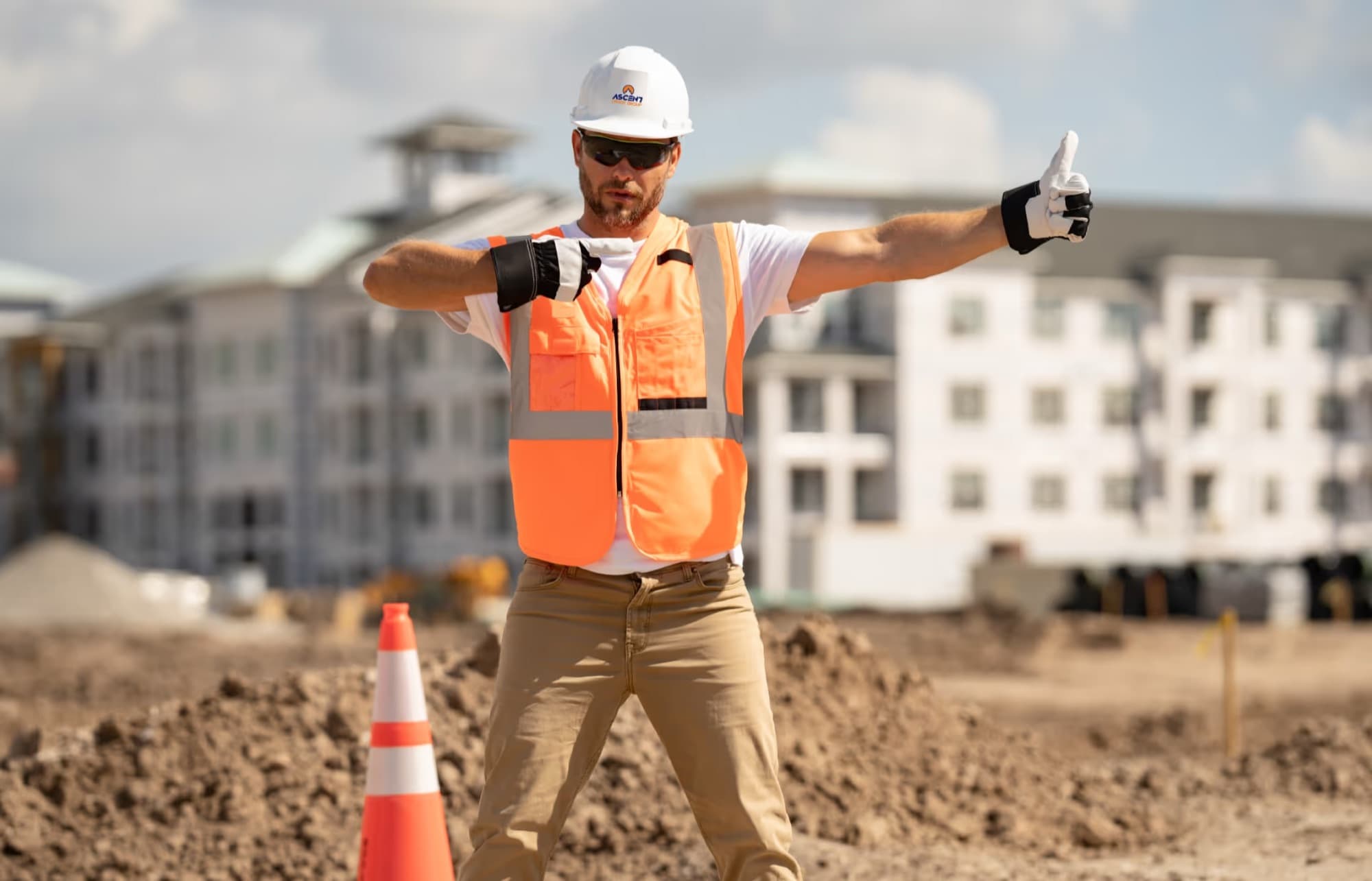 AOG traffic marshal directing vehicles on a live UK construction site