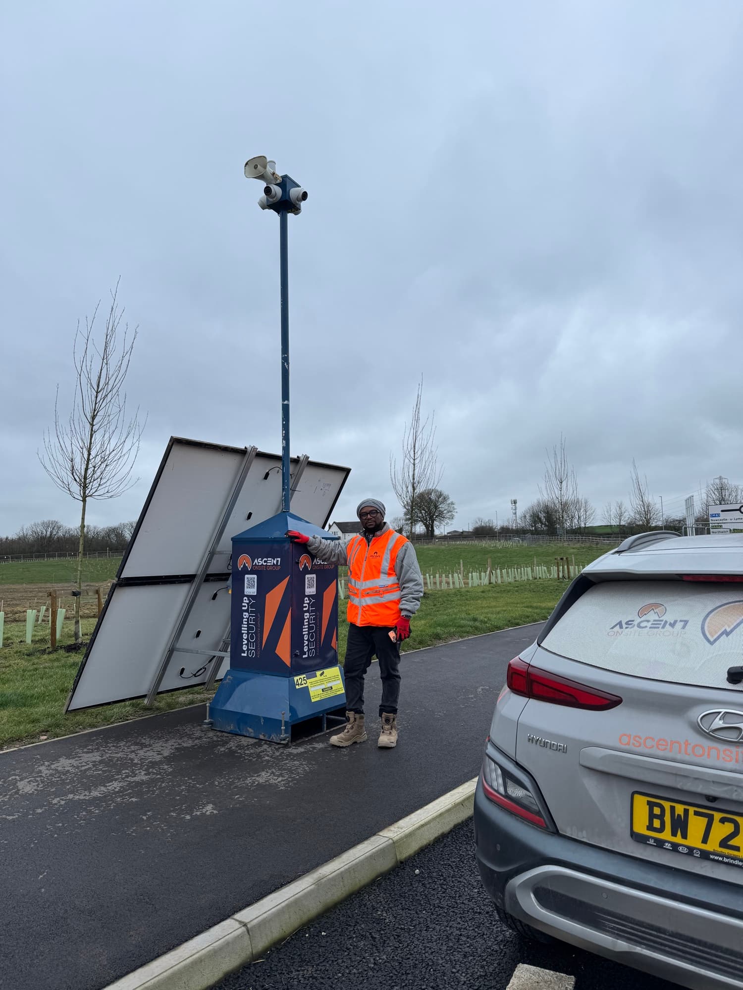 AOG technician working on a mobile CCTV tower on site
